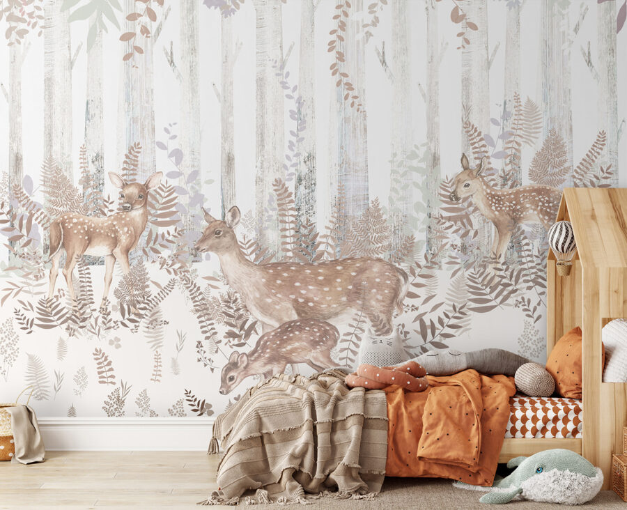 A group of deer in a forest A group of deer in a forest