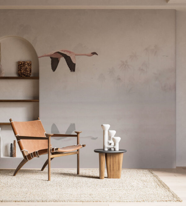 A group of flamingos flying over water