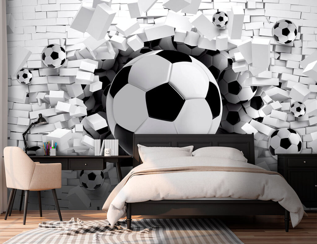 Football ball breaking through a brick wall