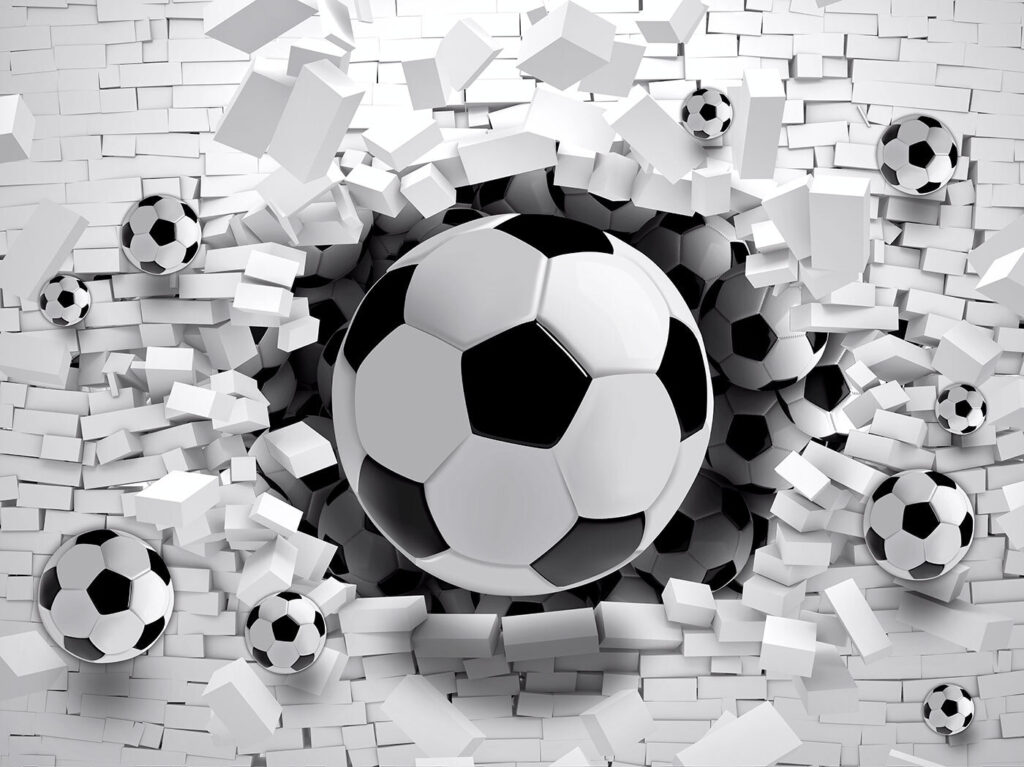 Football ball breaking through a brick wall Football ball breaking through a brick wall