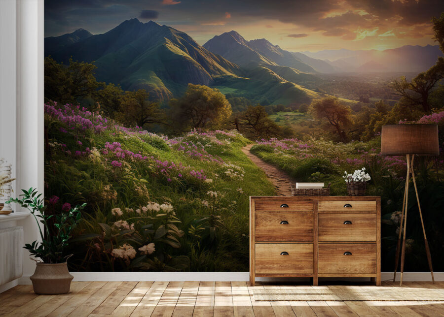 Wall murals Path through a grassy area with flowers and mountains in the background