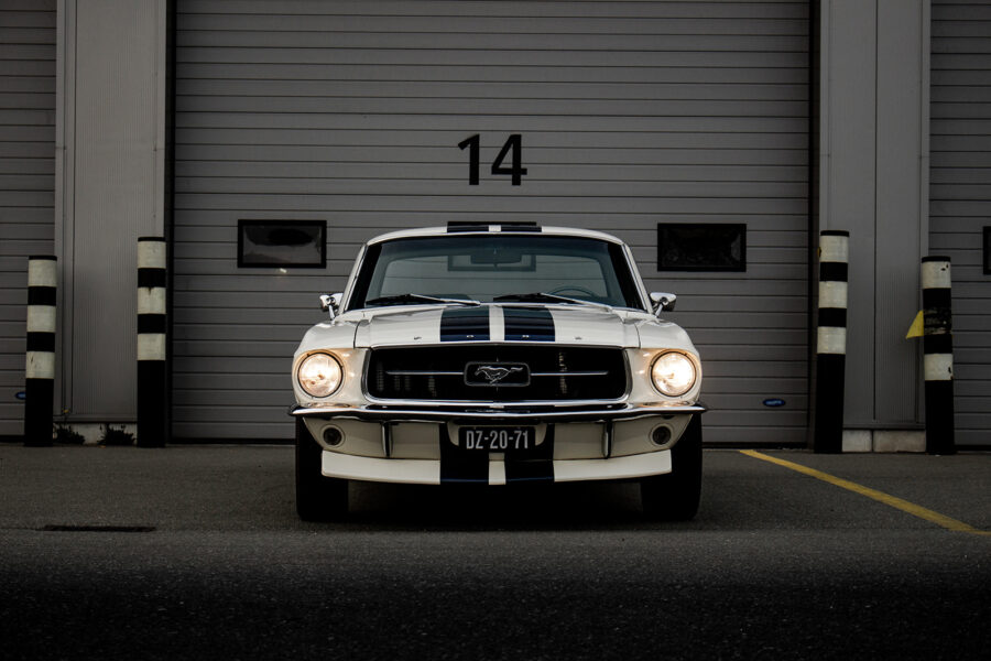 Car parked in front of a garage door