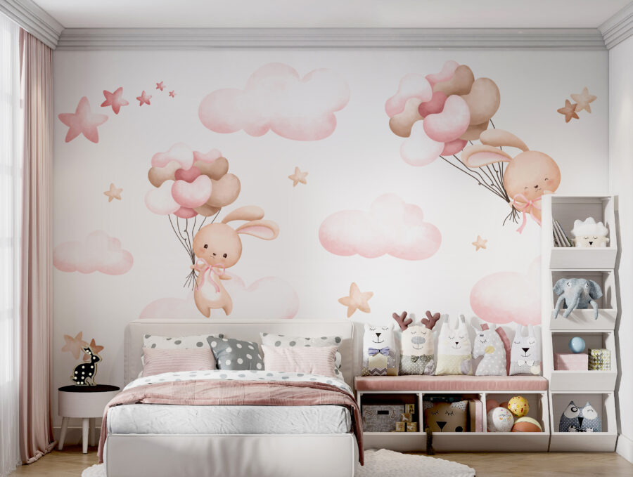 Group of pink clouds and a bunny holding balloons