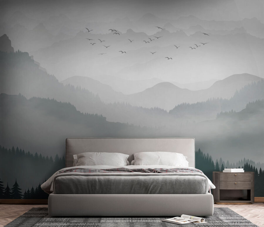 Birds flying over a mountain range