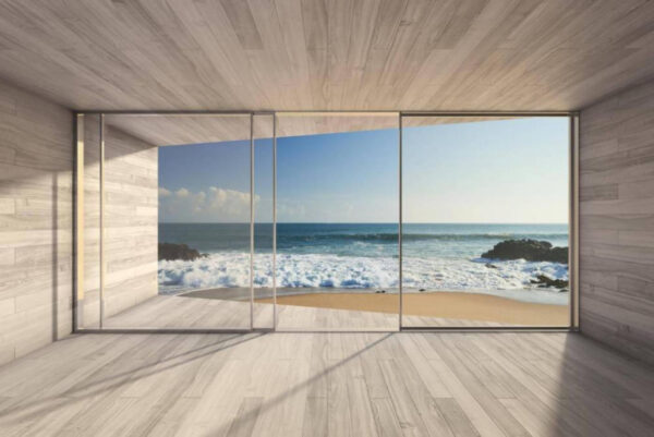 Room with large glass doors and a beach view Room with large glass doors and a beach view