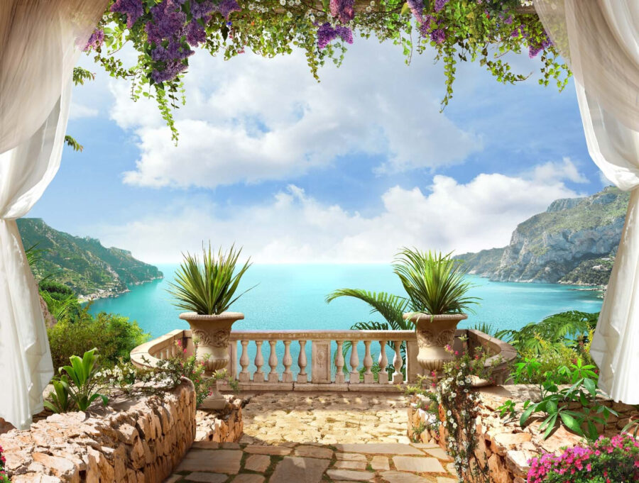 Balcony with plants and a view of the ocean