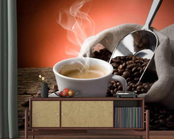 Cup of coffee with steam and coffee beans Cup of coffee with steam and coffee beans