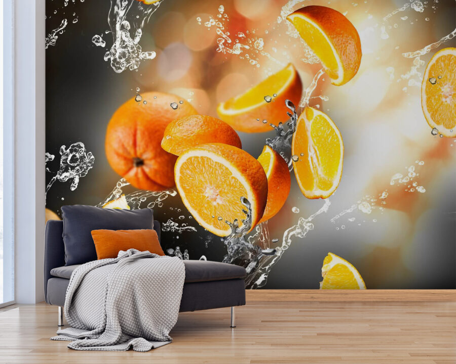 Oranges falling into water with water splashing