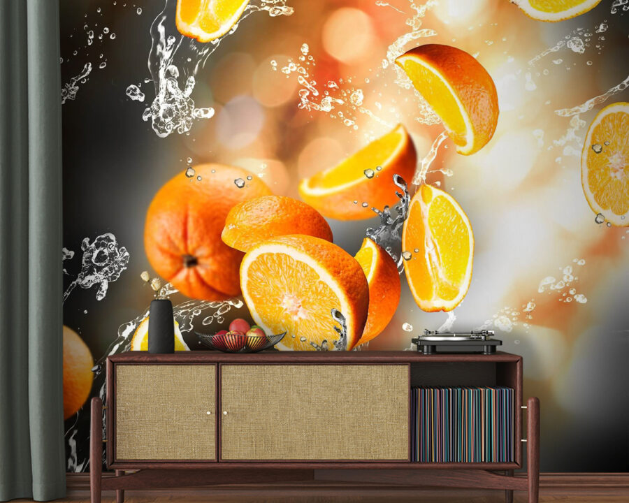 Oranges falling into water with water splashing