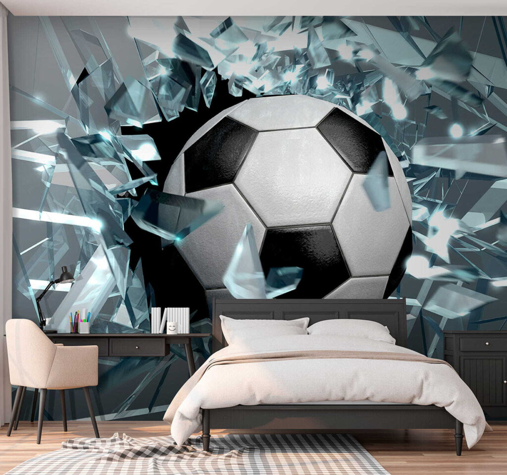 Football ball breaking through glass