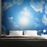 The sun shining through clouds Wall mural The sun shining through clouds