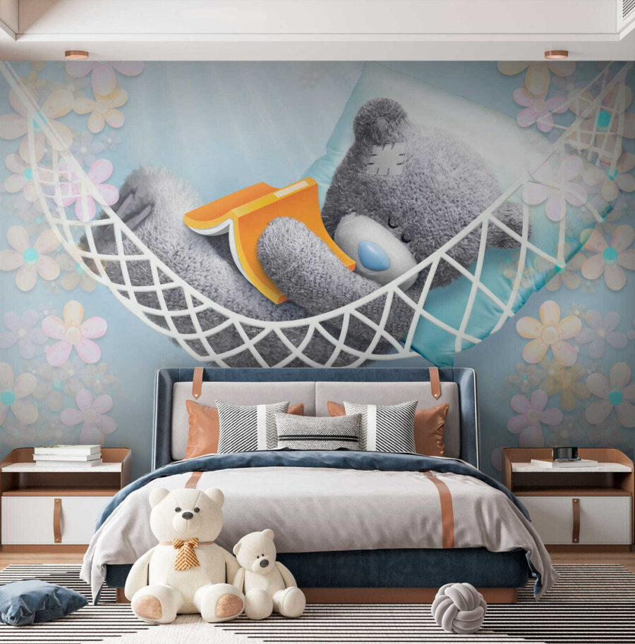 Teddy bear sleeping in a hammock