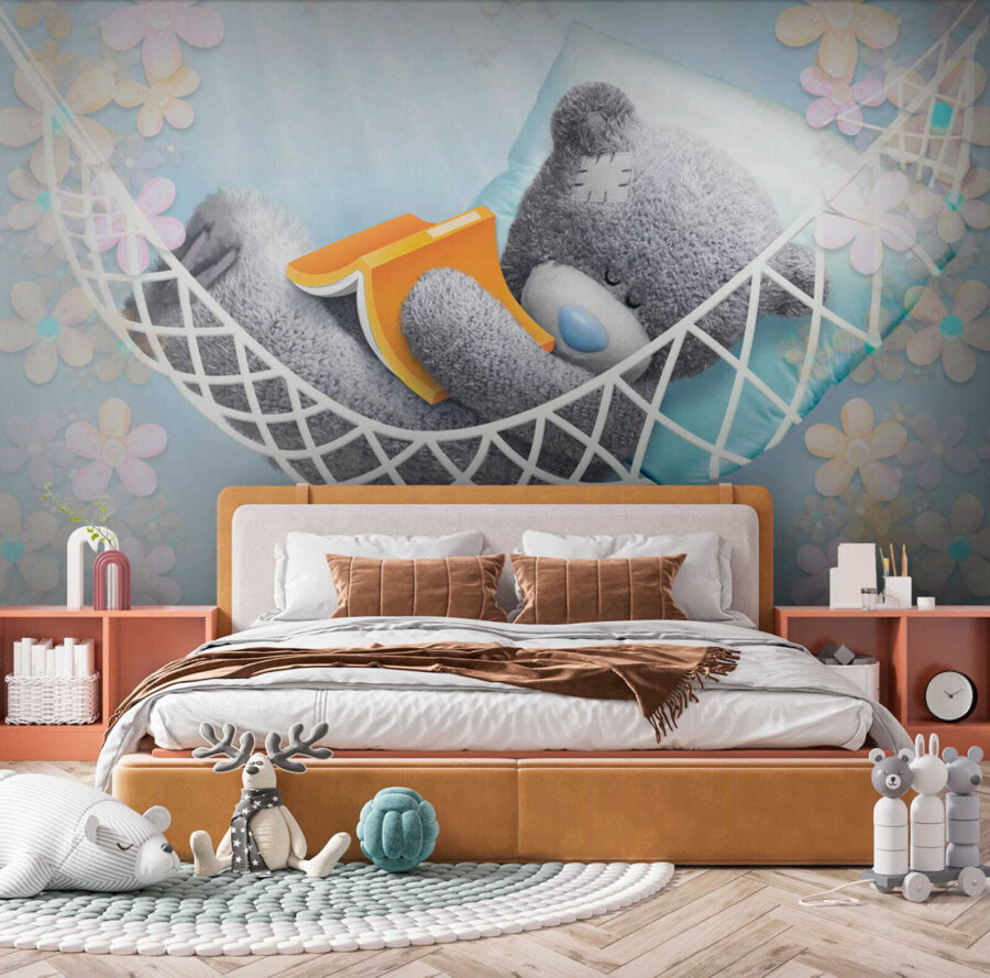 Teddy bear sleeping in a hammock