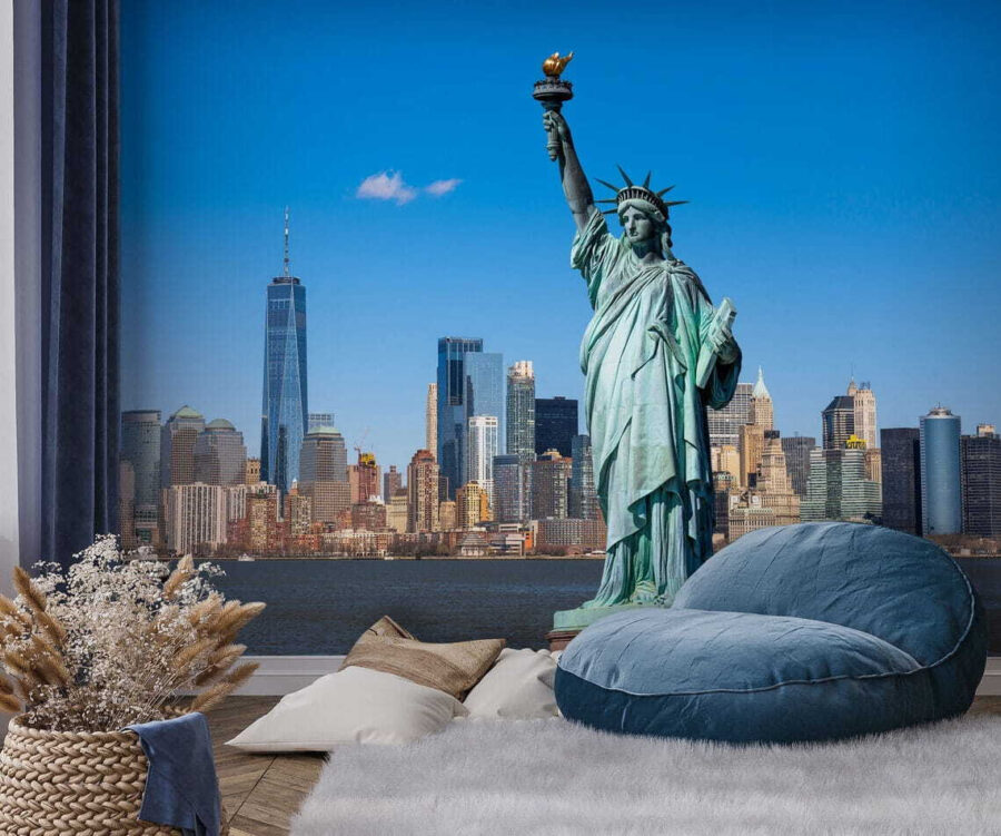 Statue of liberty with a city in the background
