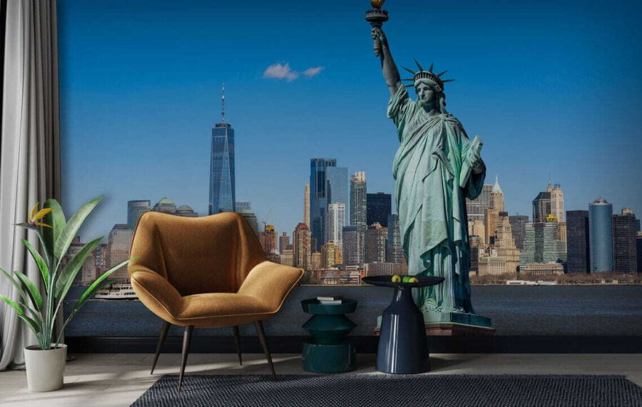 Statue of liberty with a city in the background