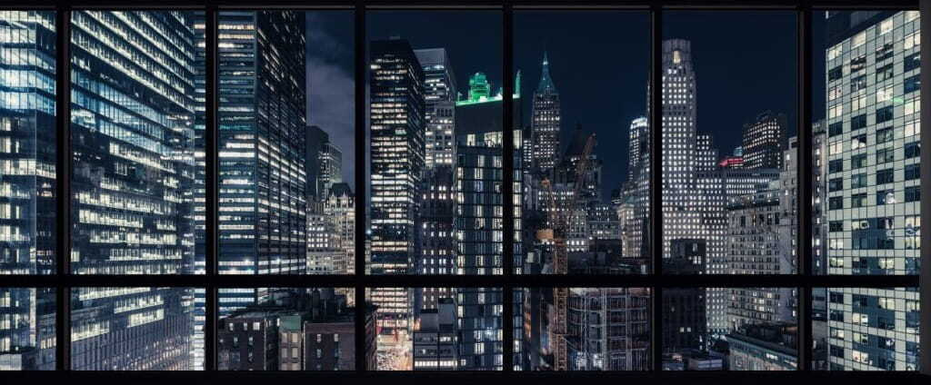 View of a city from a window at night View of a city from a window at night