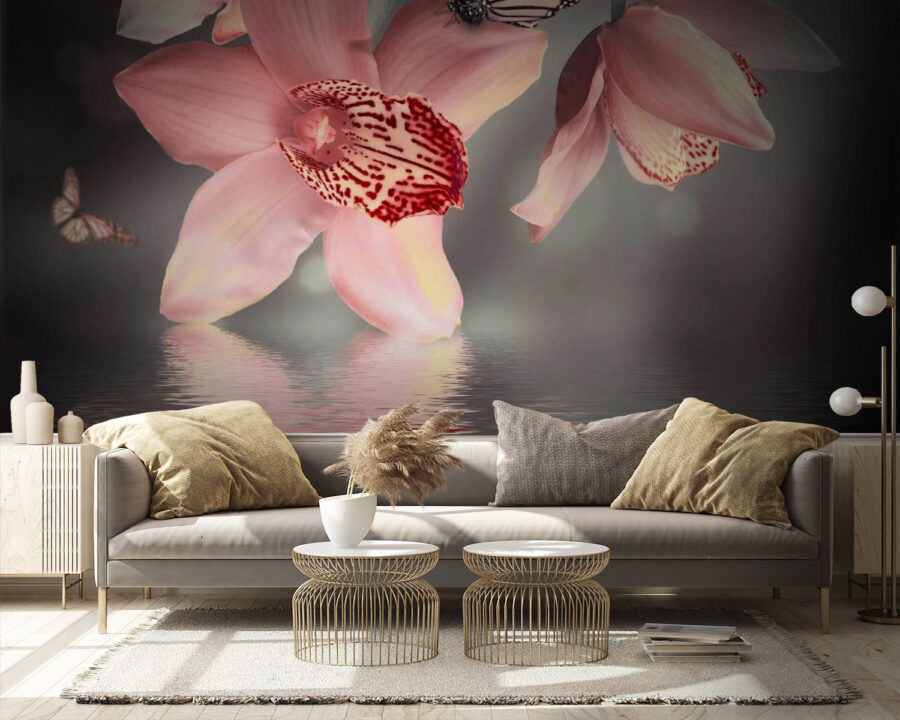 Pink orchids and butterflies on a branch