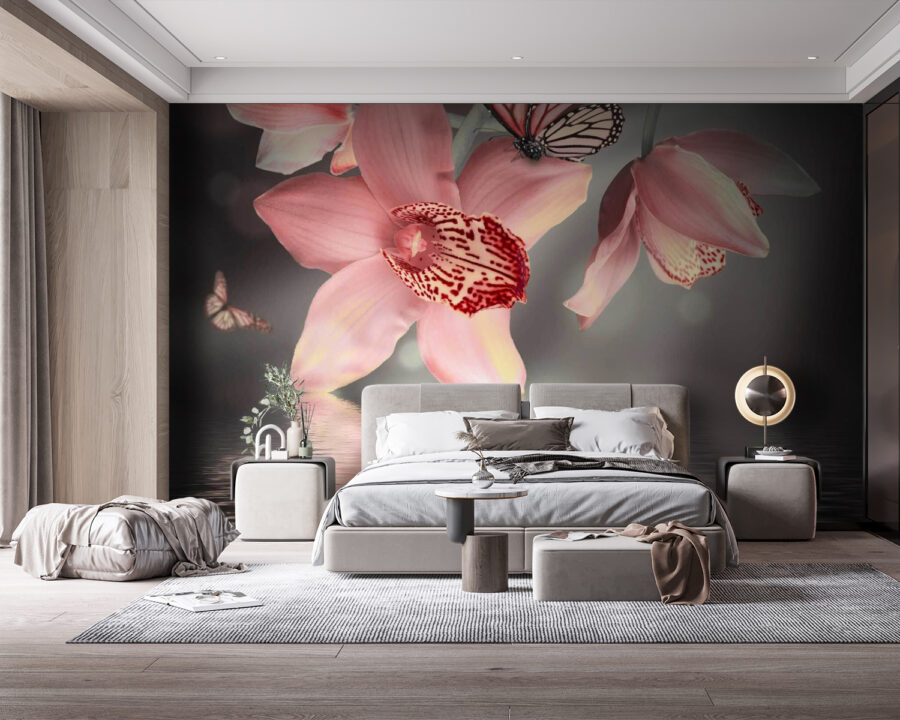 Pink orchids and butterflies on a branch
