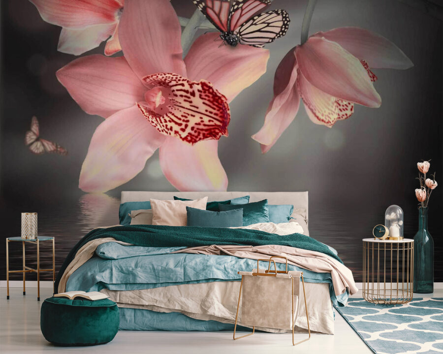 Pink orchids and butterflies on a branch