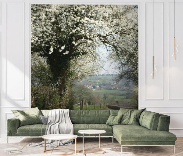 Dirt road with white flowers on it