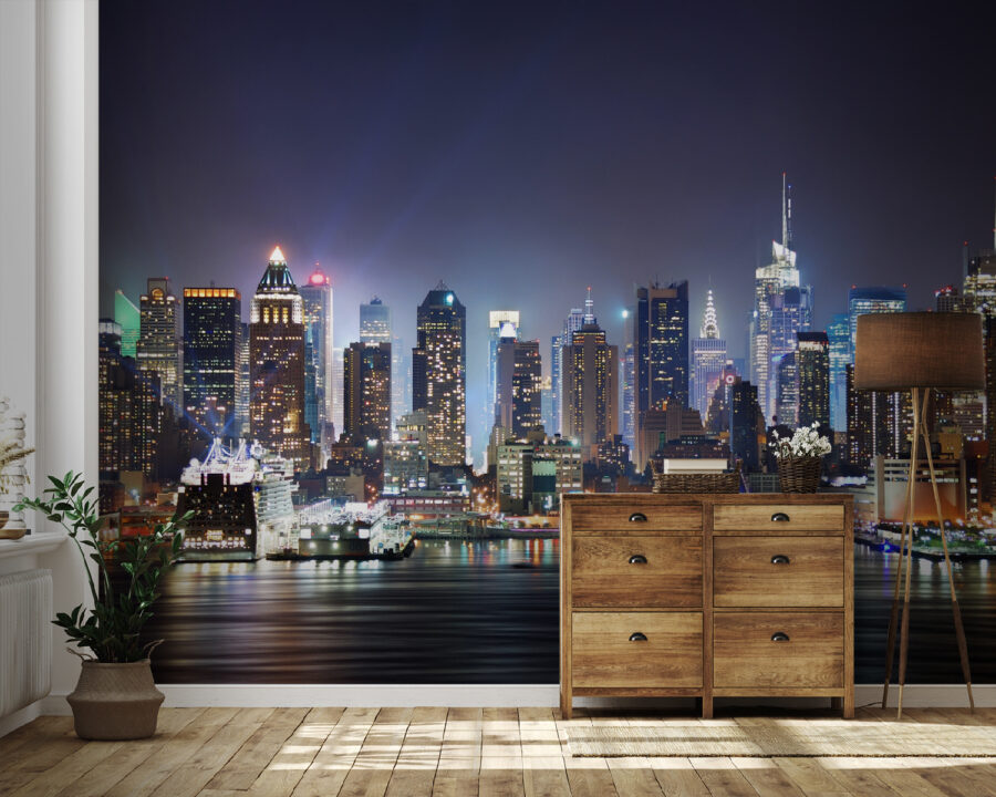 City skyline at night with lights reflecting on water