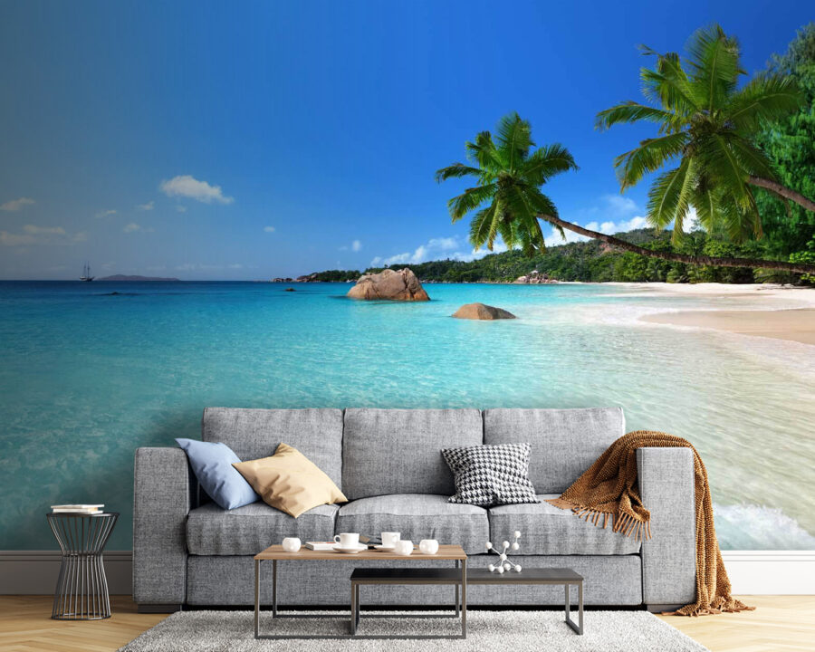 Beach with palm trees and blue water