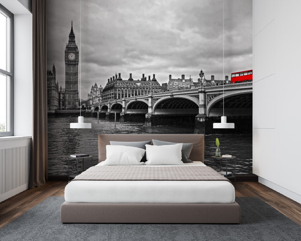 Bridge over water with a clock tower and a red bus Bridge over water with a clock tower and a red bus