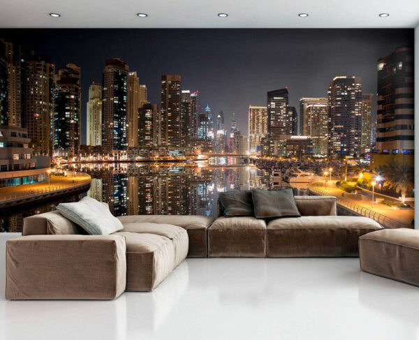 City skyline with lights reflecting on water City skyline with lights reflecting on water