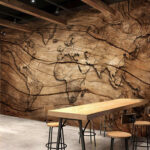 Wall murals Map of the world on a piece of wood