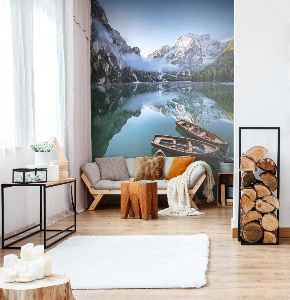 Boats on a lake with mountains in the background