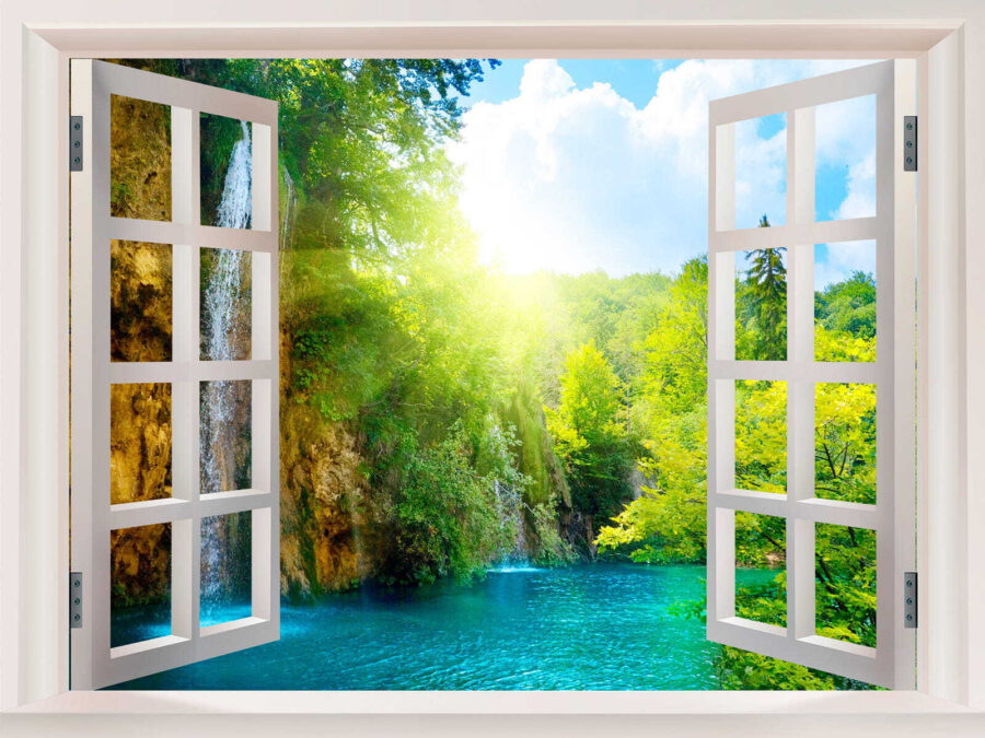 Window with a waterfall and trees