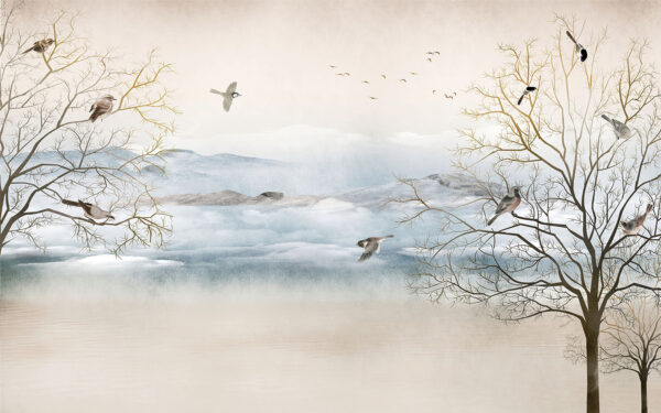 Birds flying over a snowy landscape