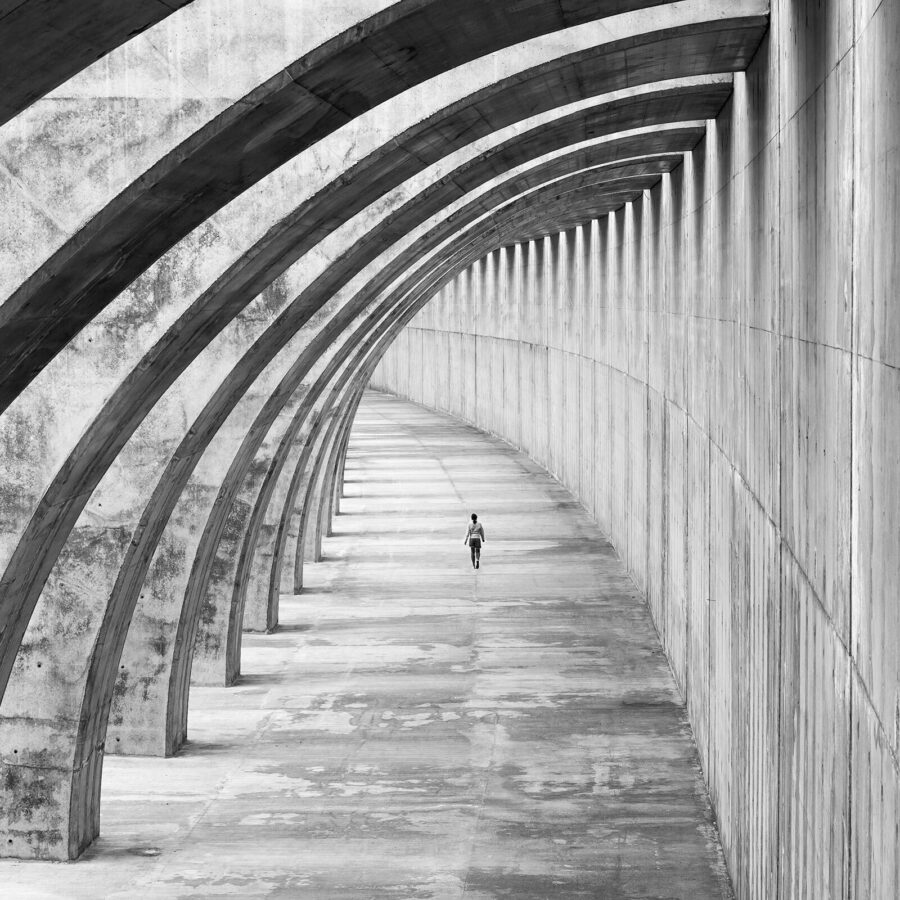 Person running in a tunnel