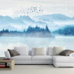 Wall murals Person in a boat on a lake with birds flying in the sky