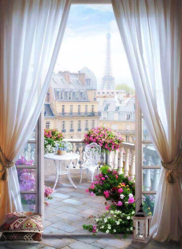 View of a balcony with a view of the eiffel tower from the window View of a balcony with a view of the eiffel tower from the window