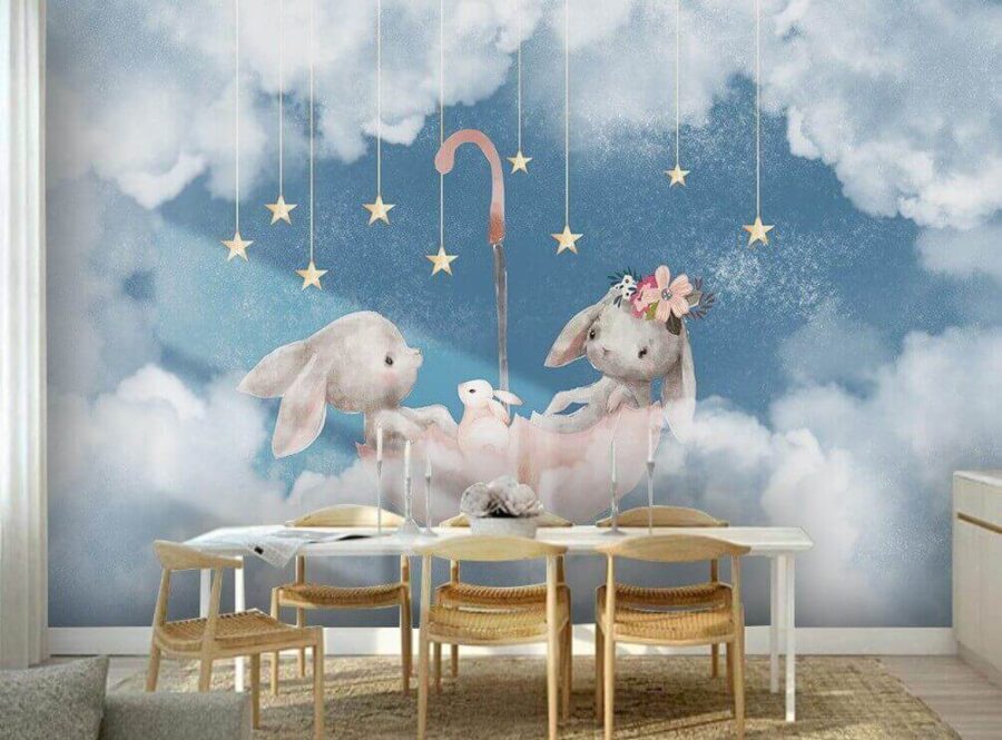 Two rabbits in a pink umbrella