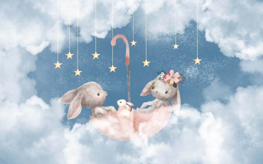 Two rabbits in a pink umbrella
