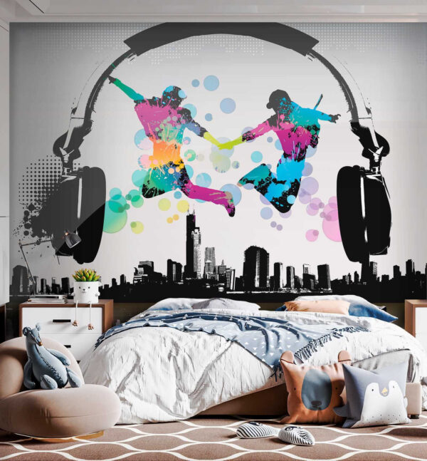 Couple of people jumping in the air with headphones