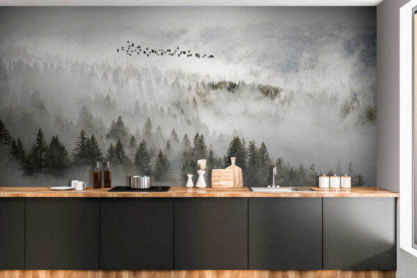 Birds flying over a forest