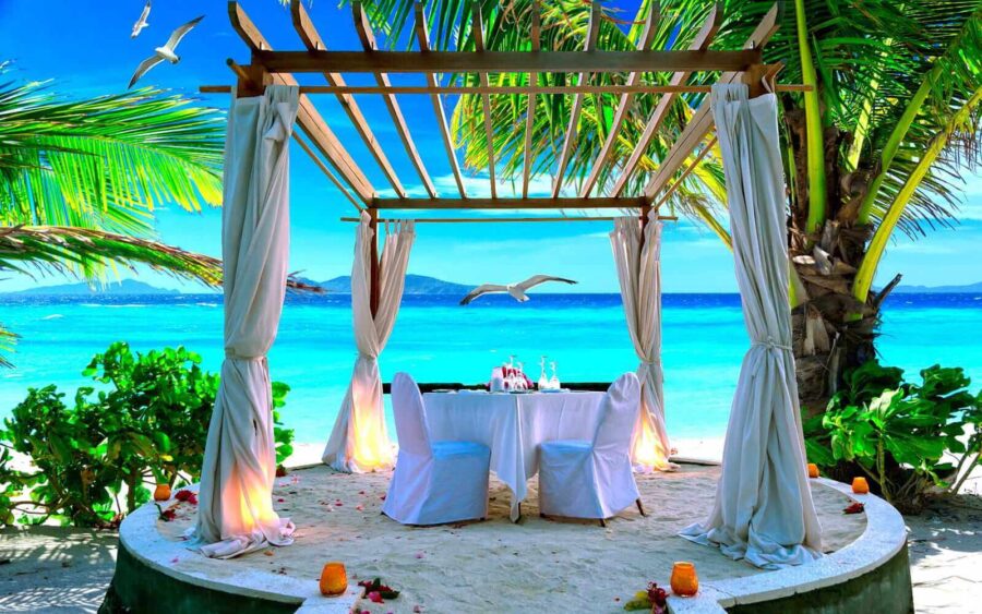 Table set up on a beach Table set up on a beach