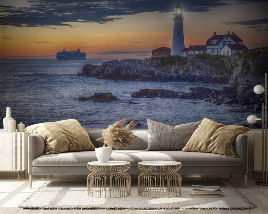 Lighthouse on a rocky shore with a cruise ship in the background