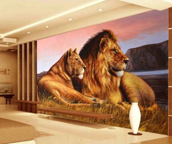 Couple of lions lying in grass Couple of lions lying in grass