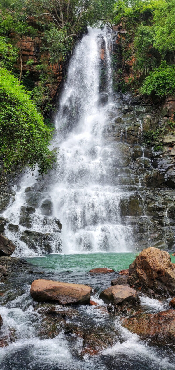 Waterfall with rocks and trees Waterfall with rocks and trees