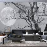 Wall mural Tree with branches and a moon in the background