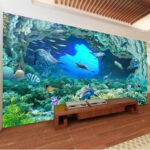 Wall murals Group of dolphins and fish under water