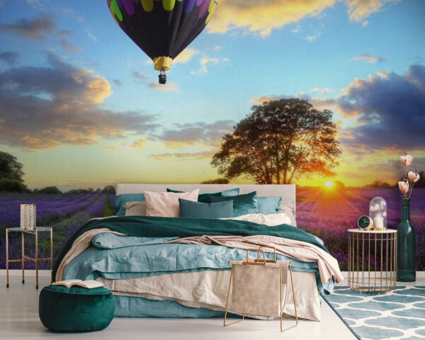 Group of hot air balloons flying over a field of flowers Group of hot air balloons flying over a field of flowers