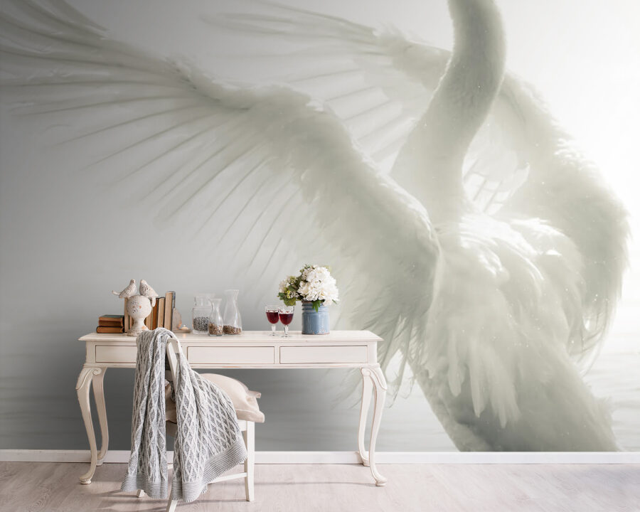 White swan with wings spread out in water