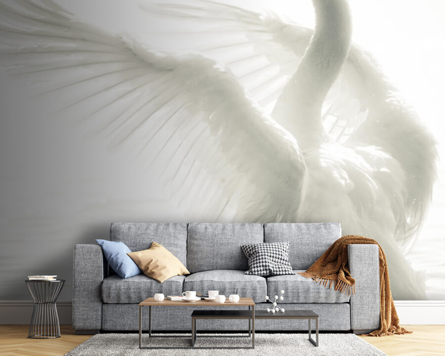 White swan with wings spread out in water
