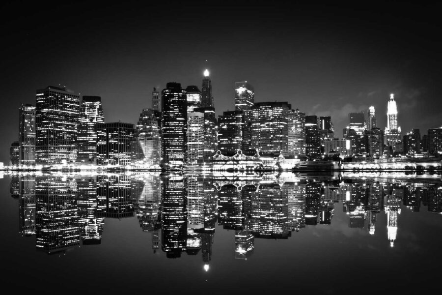 Wall murals City skyline at night with lights reflecting on water - Image 4