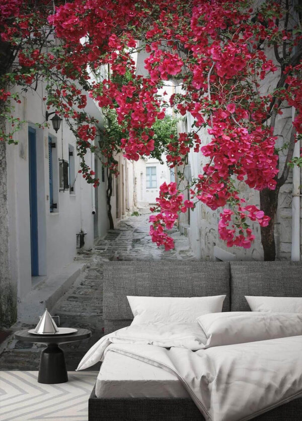Stone alley with pink flowers Stone alley with pink flowers